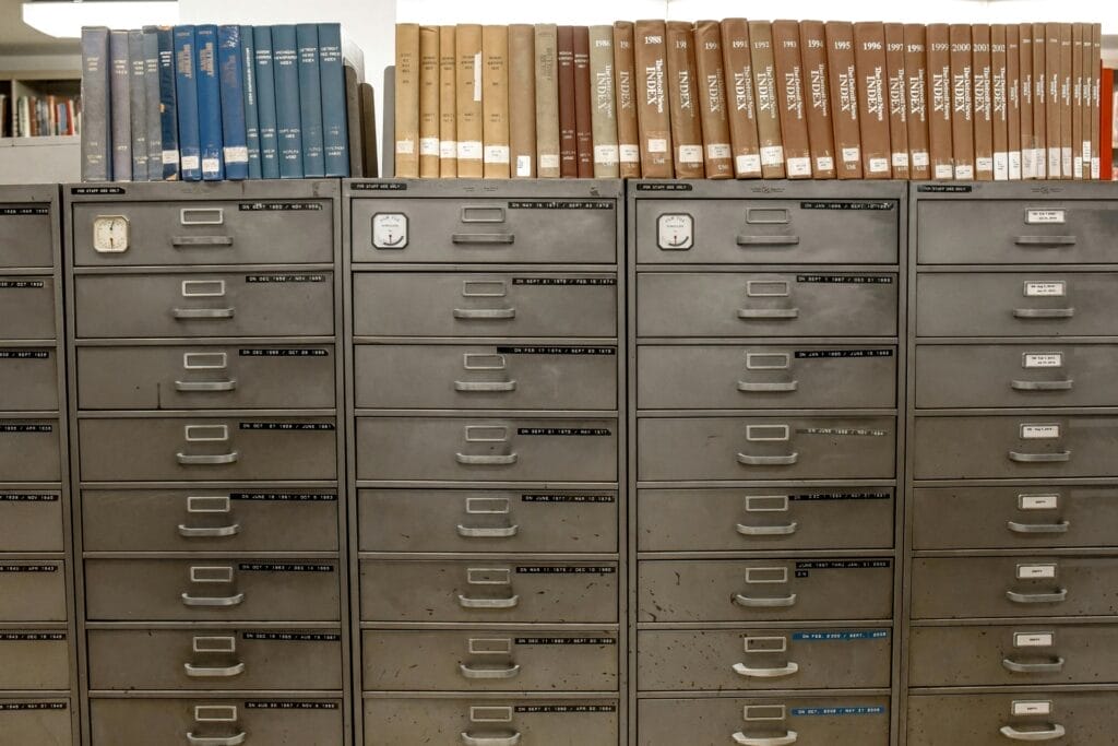 Old metal file cabinets with books on top